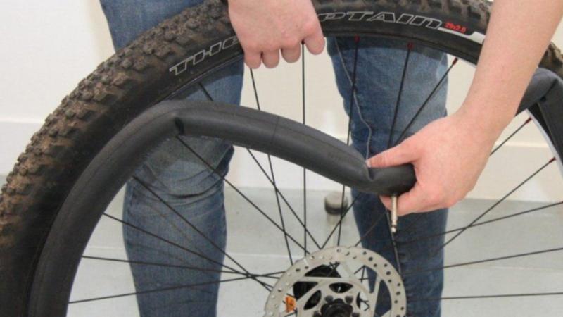 How To Change Bike Tube - Pull Out the Damaged Tube