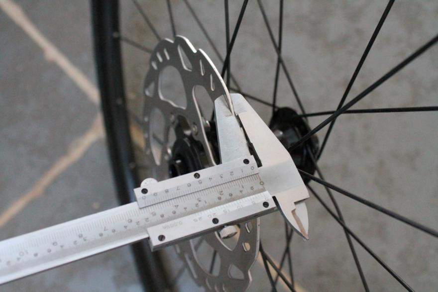 Measure the brake rotors thickness with a Vernier caliper